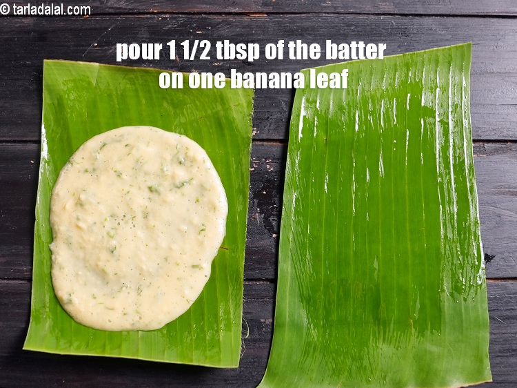 Step 32 – Pour 1 1/2&nbsp;tbsp of the batter on one banana leaf.