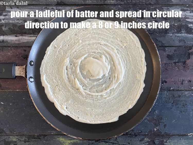 Step 28 – <meta charset="UTF-8" /> Pour a ladleful of the batter on it and spread it in …