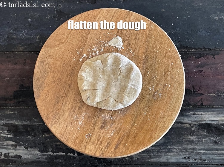 Step 30 – Flatten the stuffed dough.