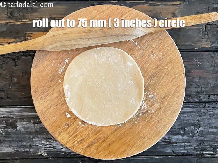 Step 23 – Roll out one portion of the dough into a circle of 75 mm. (3&quot;) diameter.