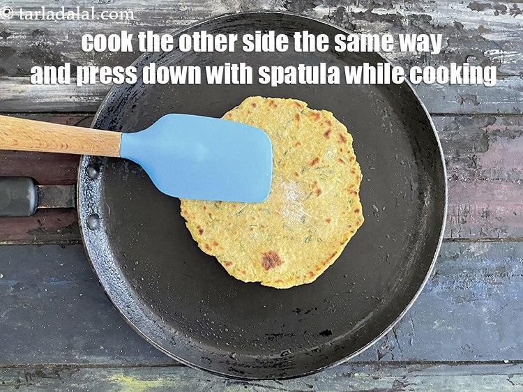 Step 26 – Cook the other side the same way and use a spatula to press down to …