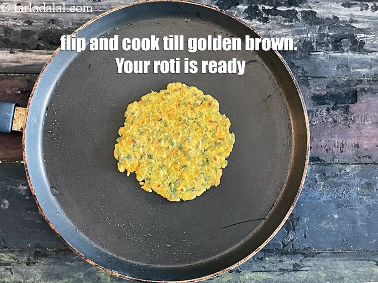 Step 23 – <html><head><meta charset="UTF-8"> </head><body><p>Flip and cook till golden brown.&nbsp;Your paratha is ready.&nbsp;</p></body></html>