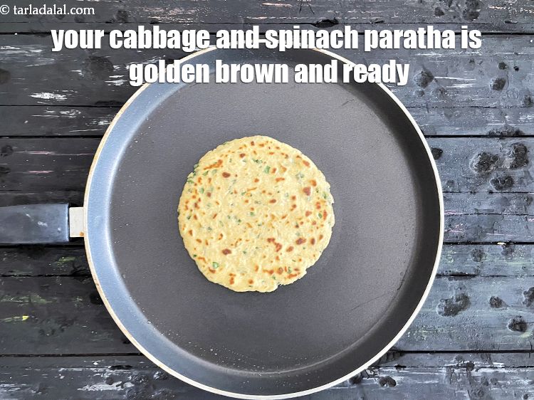 Step 24 – <meta charset="UTF-8" />Keep flipping the roti for a few seconds till it turns golden brown. …