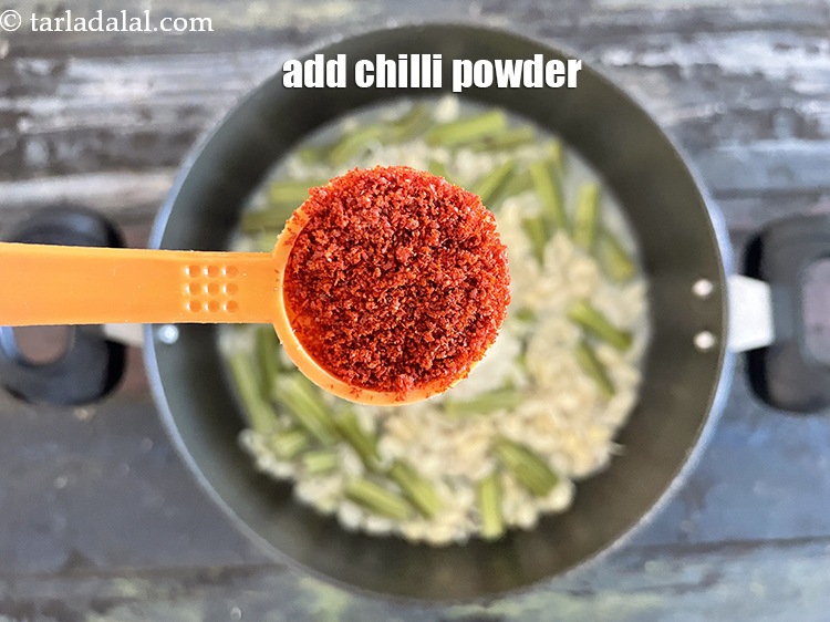 Step 28 – Add&nbsp;<meta charset="UTF-8" />1 tsp&nbsp;<a href="glossary-chilli-powder-red-chilli-powder-339i">chilli powder</a>.