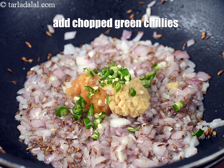 Step 23 – Add 1 tsp <a href="https://www.tarladalal.com/glossary-chopped-green-chilli-820i">chopped green chillies</a>.