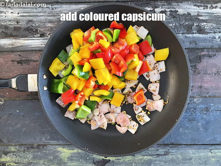 Step 23 – Add&nbsp;2 cups&nbsp;<a href="glossary-capsicum-cubes-170i">capsicum cubes</a>&nbsp;(red , yellow and green).
