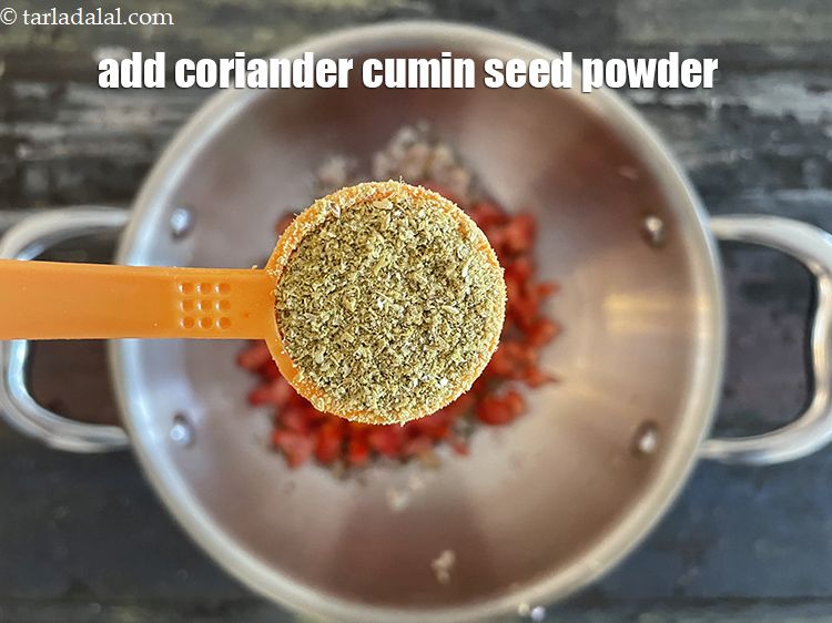 Step 32 – Add 1 1/2&nbsp;tsp&nbsp;<a href="glossary-coriander-cumin-seeds-powder-dhania-jeera-powder-375i">coriander-cumin seeds (dhania-jeera) powder</a>.