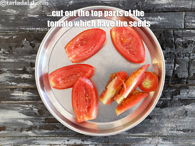 Step 29 – With knife, cut out the top part of the 4 tomato pieces where the seeds …