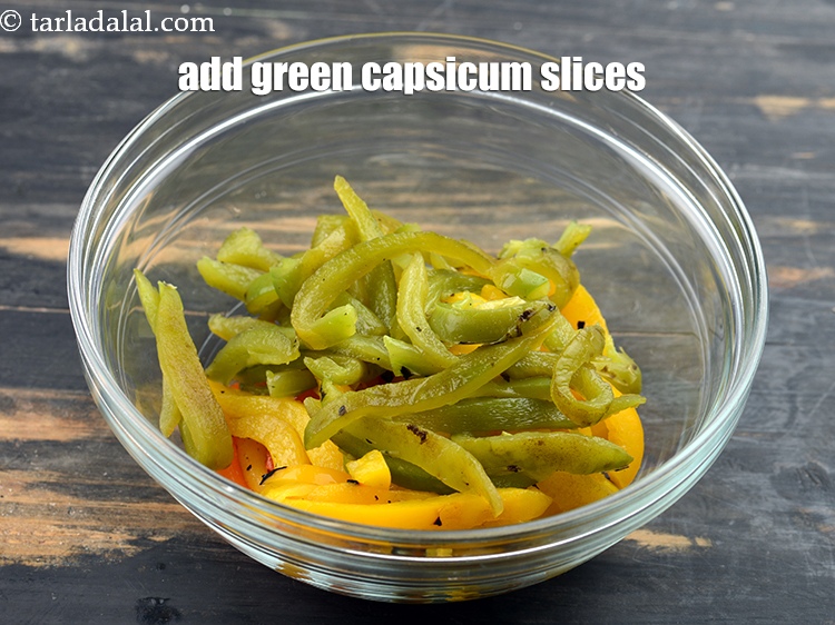 Step 24 – Add green capsicum slices.