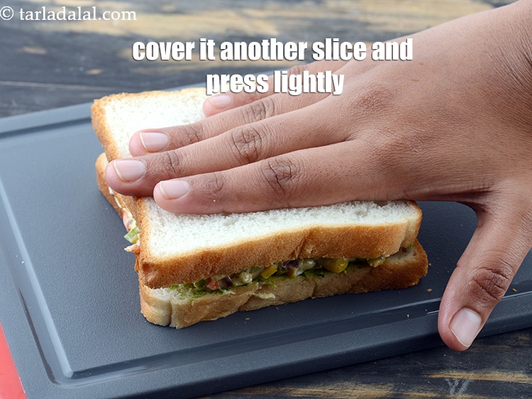 Step 22 – And cover it with the slice with the buttered-chutney side facing downwards and press it …