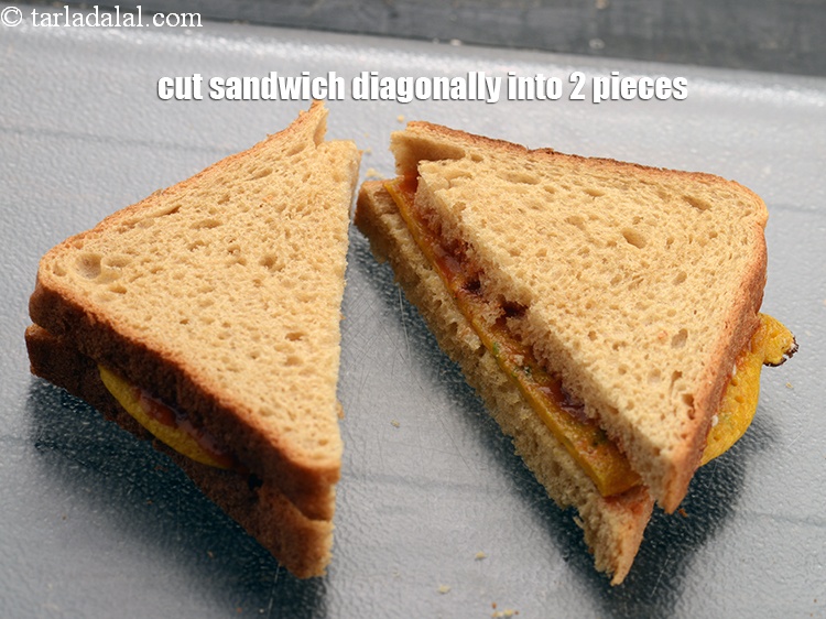 Step 23 – Cut the sandwich diagonally into 2 pieces.