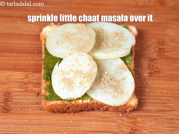 Step 25 – Sprinkle little <a href="https://www.tarladalal.com/chaat-masala-164r">chaat masala</a>&nbsp;evenly over it.