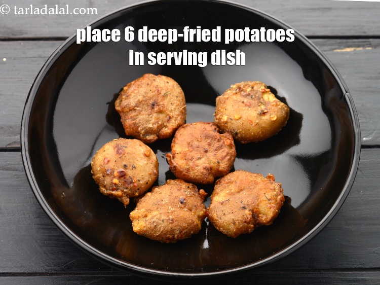 Step 23 – Place 6 deep-fried potatoes in a serving dish.&nbsp;
