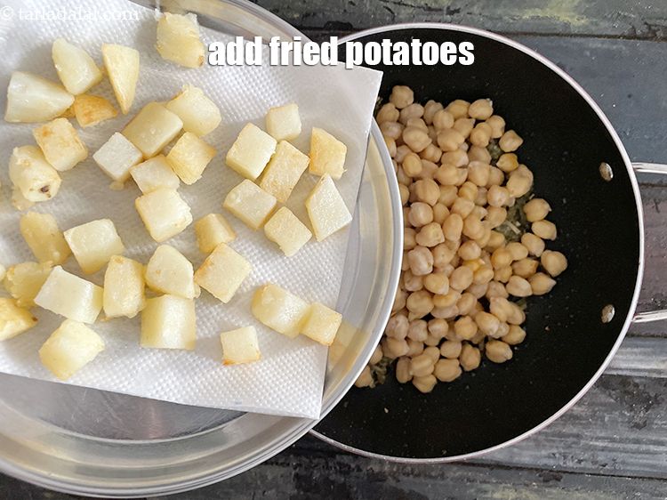 Step 23 – Add&nbsp;fried potatoes.