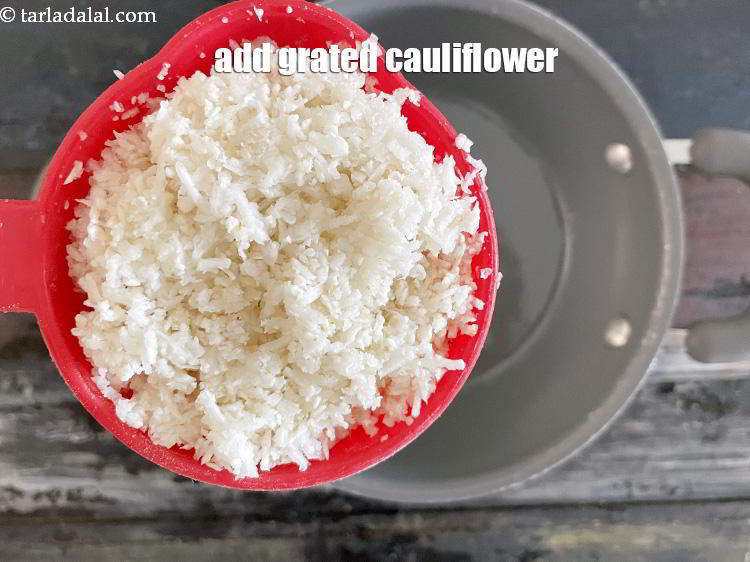 Step 23 – Add&nbsp;<meta charset="UTF-8" />1 cup&nbsp;<a href="glossary-grated-cauliflower-994i">grated cauliflower</a>.