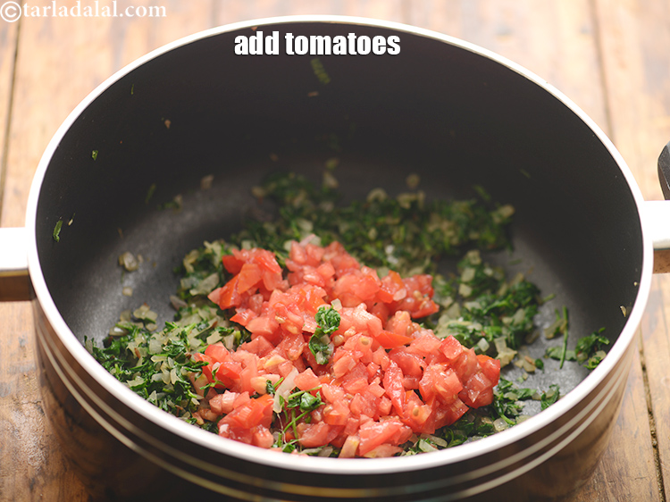 Step 38 – Add 1/2 cup&nbsp;finely&nbsp;<a href="https://www.tarladalal.com/glossary-chopped-tomatoes-779i">chopped tomatoes</a>. This gives a nice sourness to the dish.&nbsp;<a href="https://www.tarladalal.com/recipes-using-tomatoes-639">Tomatoes</a>&nbsp;are extremely …