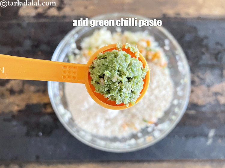 Step 25 – Add&nbsp;<meta charset="UTF-8" />1 tsp&nbsp;<a href="glossary-green-chilli-paste-hari-mirch-ki-paste-mirchi-paste-333i">green chilli paste</a>.