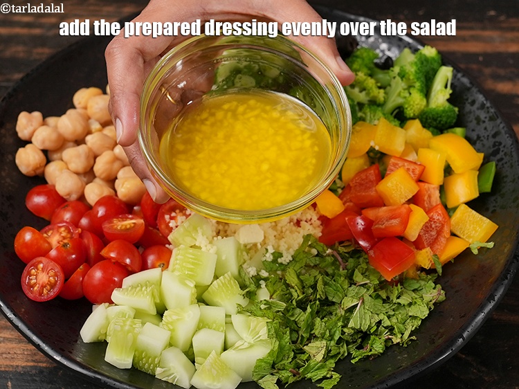 Step 24 – Add the prepared dressing evenly over the salad.