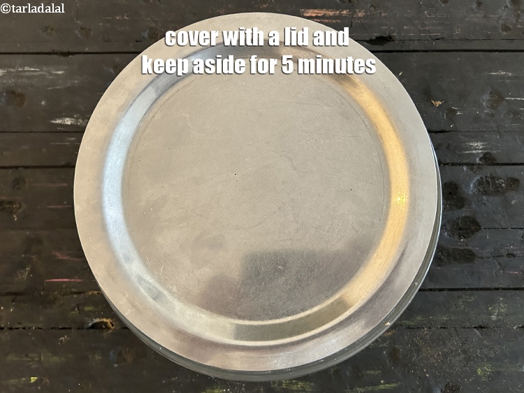Step 24 – Cover with a lid and keep aside for 5 minutes.