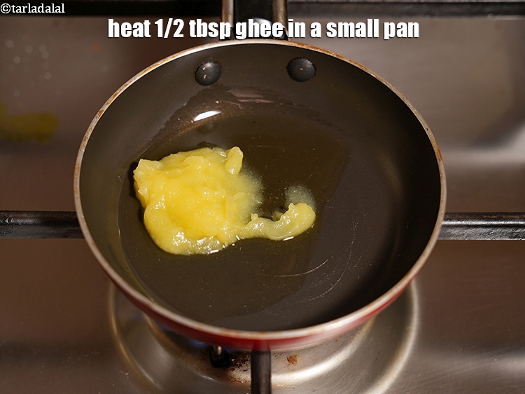 Step 30 – For the tempering, heat 1/2 tbsp <a href="https://www.tarladalal.com/glossary-ghee-245i">ghee</a>&nbsp;in a small pan.