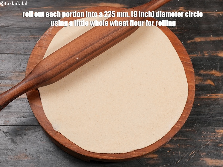 Step 24 – Roll out each portion into a 225 mm. (9 inch) diameter circle using a little …