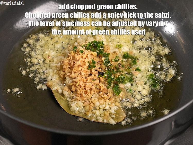 Step 24 – Add 2 <a href="https://www.tarladalal.com/glossary-chopped-green-chilli-820i">chopped green chillies</a>. Chopped green chilies add a spicy kick to the …