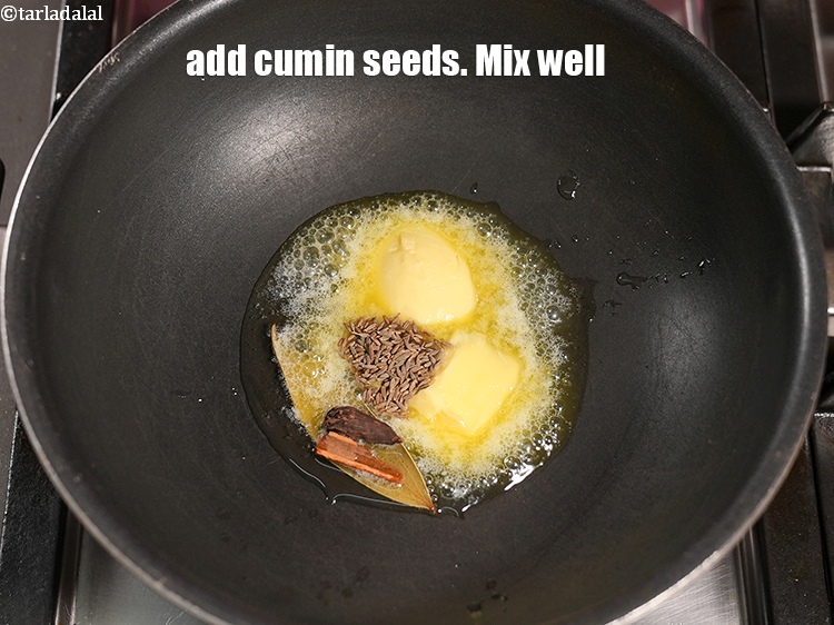 Step 24 – Add &frac12; tsp <a href="https://www.tarladalal.com/glossary-cumin-seeds-jeera-zeera-381i">cumin seeds (jeera)</a>. Mix well.