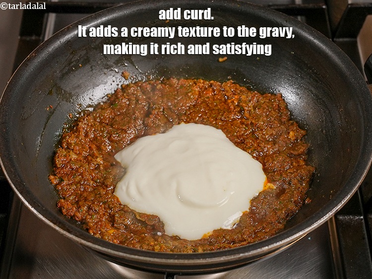 Step 24 – Add &frac14; cup curd. It adds a creamy texture to the gravy, making it rich …