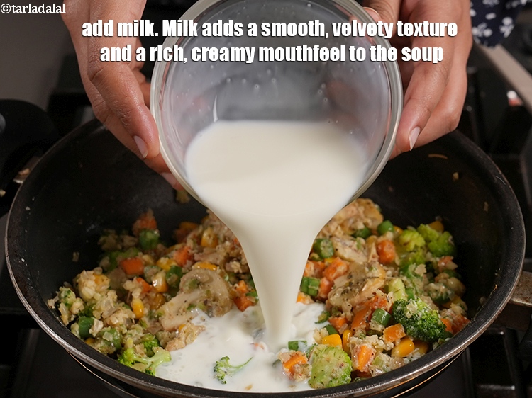 Step 24 – <p>Add 2 cups <a href="https://www.tarladalal.com/glossary-milk-doodh-full-cream-milk-514i">milk</a>. Milk adds a smooth, velvety texture and a rich, creamy …