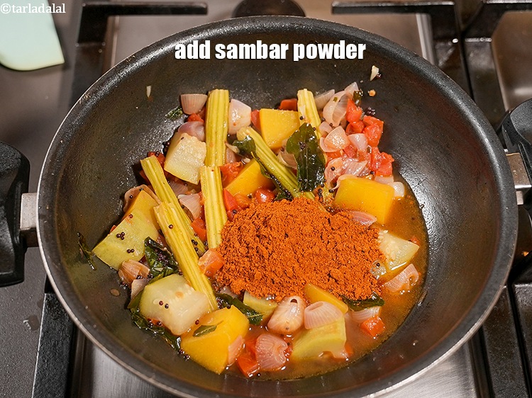 Step 24 – Add &frac12; tbsp <a href="https://www.tarladalal.com/glossary-sambar-powder-south-indian-sambar-powder-1193i">sambar powder</a>.