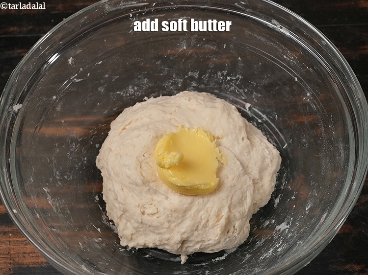 Step 25 – Add &frac12; tbsp <a href="https://www.tarladalal.com/glossary-soft-butter-naram-makhan-1942i">soft butter</a>.