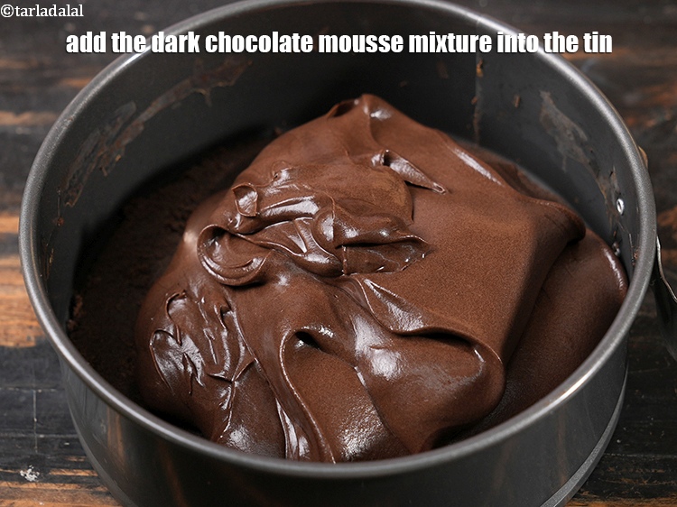 Step 24 – Add the dark chocolate mousse mixture into the tin.
