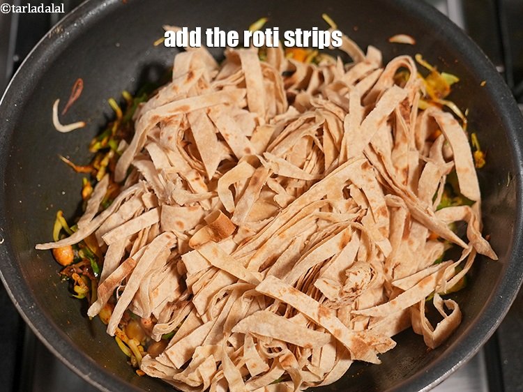 Step 27 – Add the roti strips.