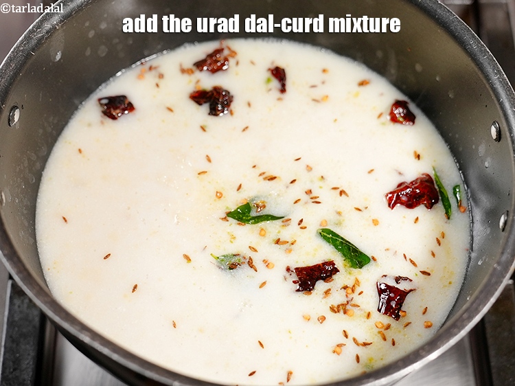 Step 24 – Add the urad dal-curd mixture.