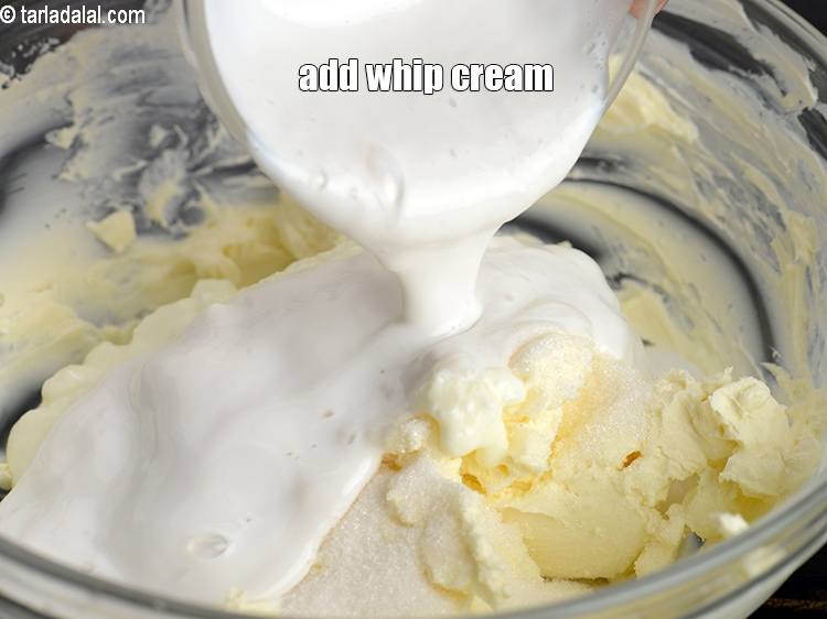 Step 25 – Add &frac12; cup whip <a href="https://www.tarladalal.com/glossary-cream-malai-851i">cream</a>. This is not beaten.&nbsp;