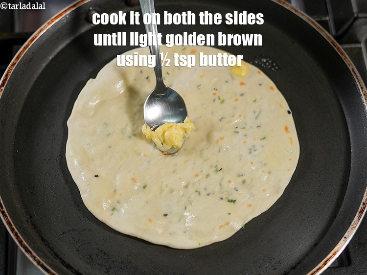 Step 24 – Cook it on medium flame on both the sides until light golden brown using &frac12; …