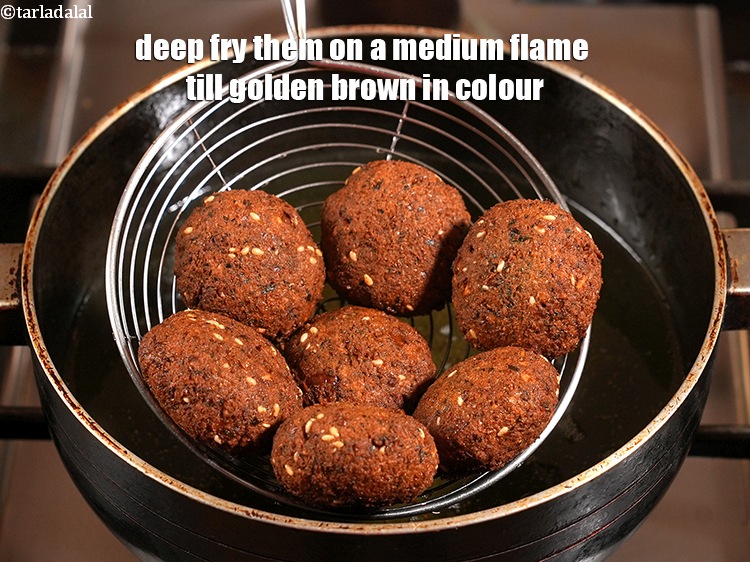 Step 24 – Deep fry them on a medium flame till golden brown in colour.