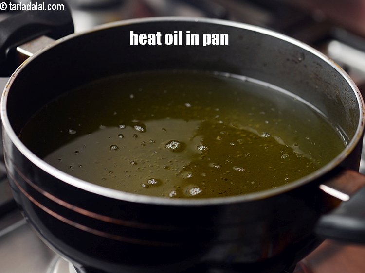 Step 24 – Heat oil in a deep pan.