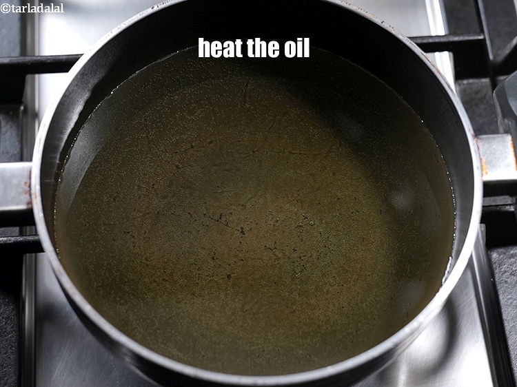 Step 24 – Heat the oil in a deep non-stick kadhai.&nbsp;
