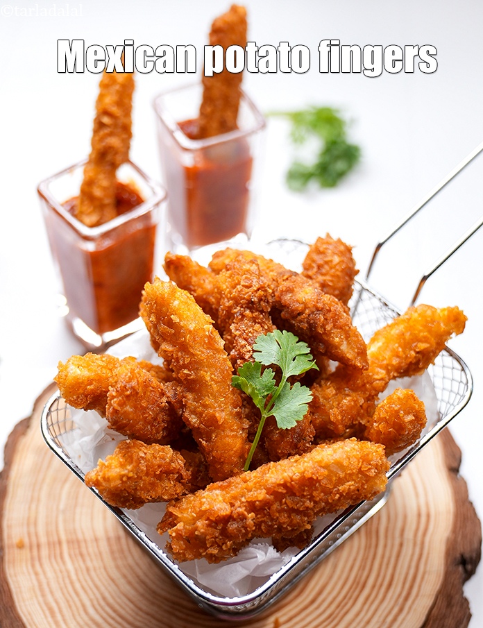 Step 24 – Serve <strong>crusty potato fingers</strong> immediately with schezwan sauce.