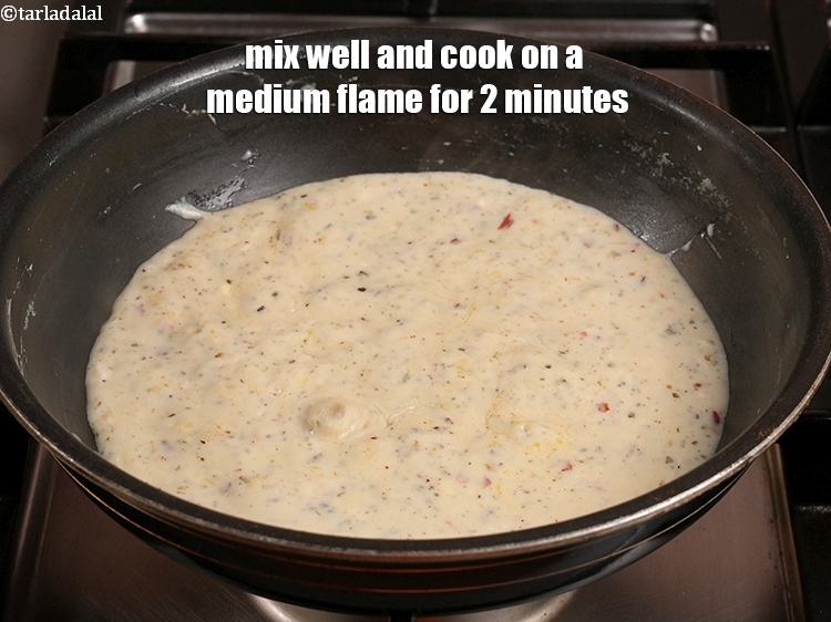 Step 24 – Mix well and cook on a medium flame for 2 minutes, while stirring continuously.