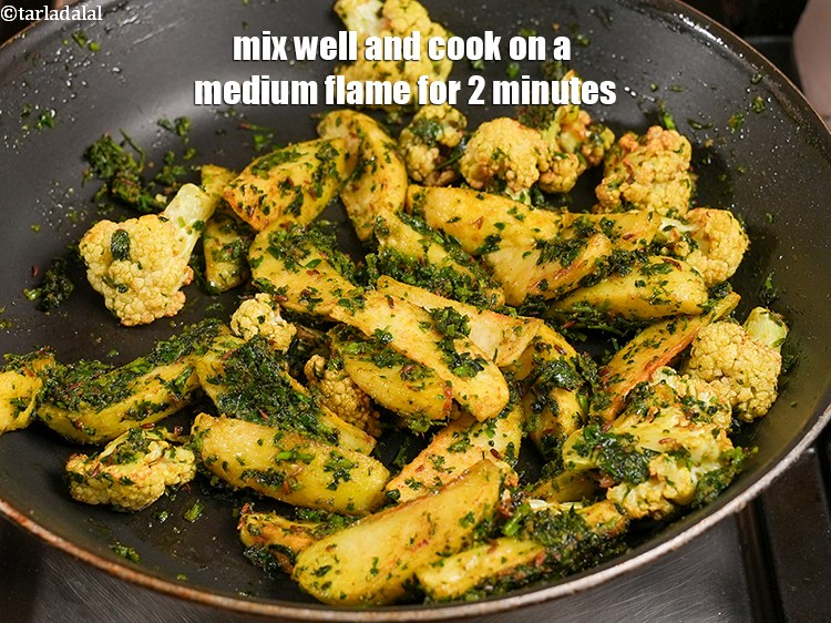 Step 24 – Mix well and cook on a medium flame for 2 minutes, while stirring occasionally.