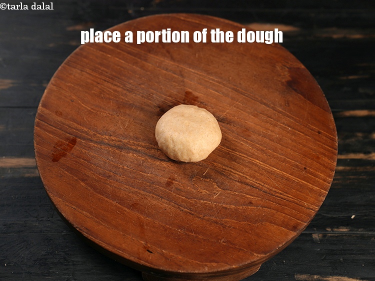 Step 26 – Place a portion of the dough on a rolling board.