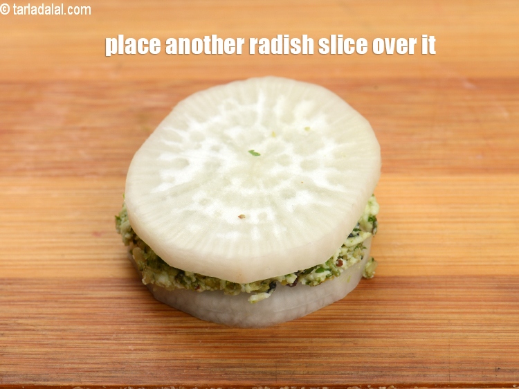 Step 25 – Place another radish slice over it.