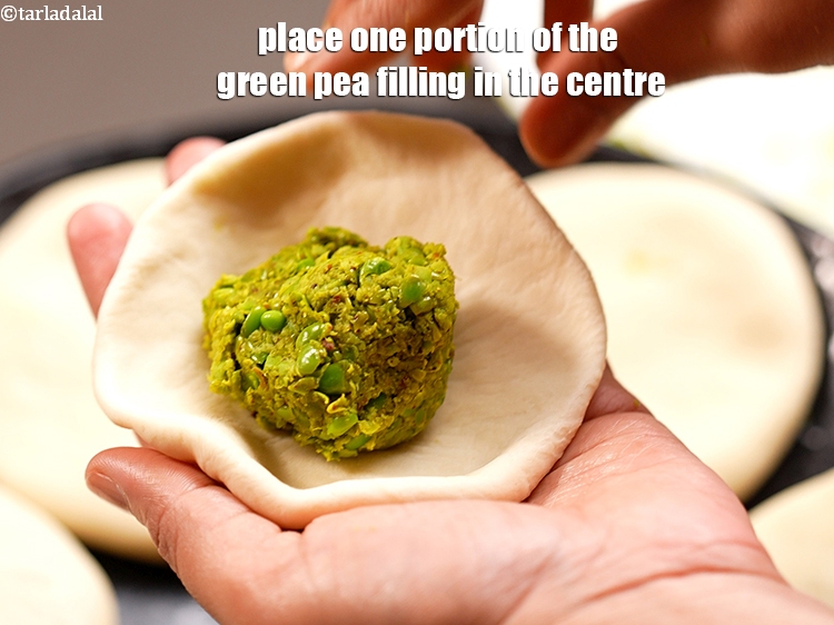 Step 24 – Place one portion of the green pea filling in the centre.