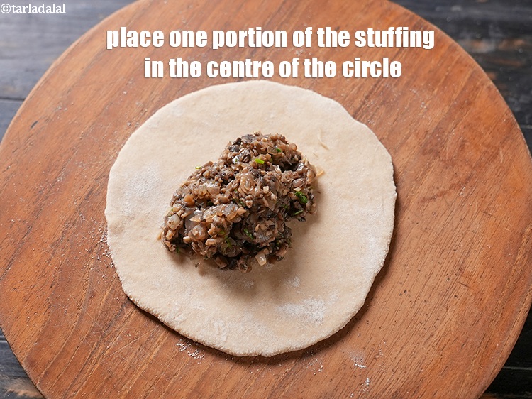 Step 25 – Place one portion of the stuffing in the centre of the circle.