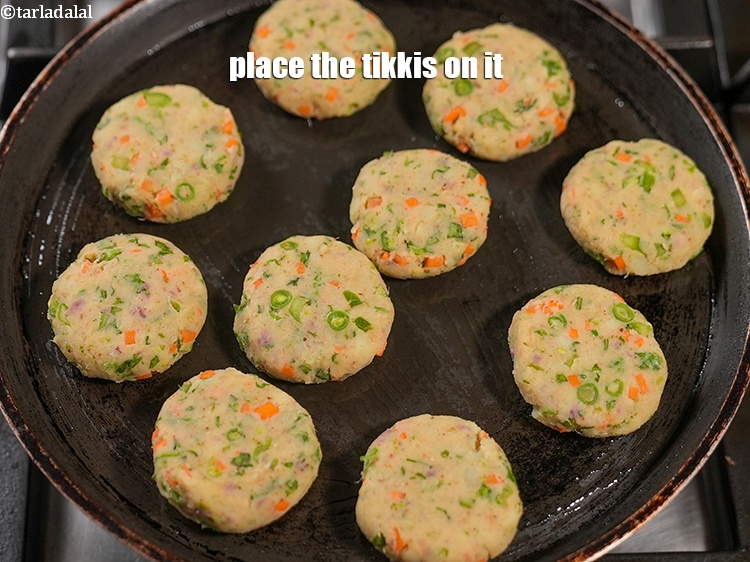 Step 24 – Place the tikkis on it.