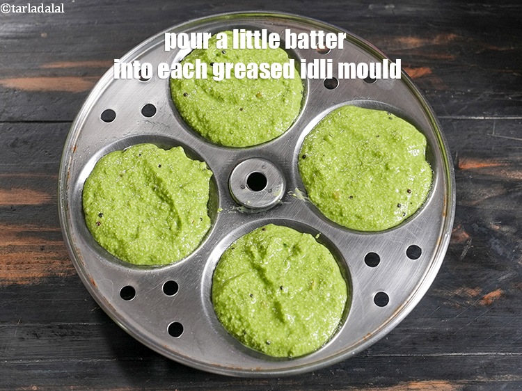 Step 24 – Pour a little batter into each greased idli mould.&nbsp;