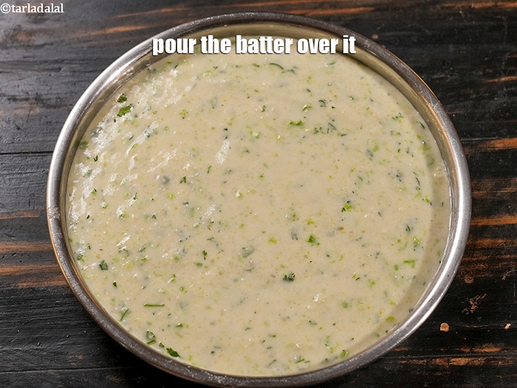 Step 24 – Pour the batter over it.