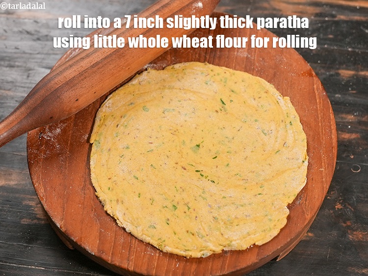 Step 24 – Now roll into a 7 inch slightly thick paratha using little whole wheat flour for …